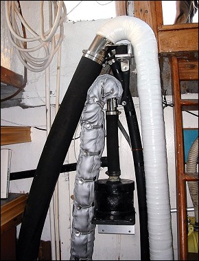 Deep hulled sail boat - Tall dry risers for both the Cummins 4B main and 2 Kw Yanmar auxiliary. The tops of both engines are about 12" below the waterline