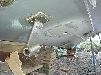 Custom heavy duty stainless steel struts were made to allow bigger props and 1 3/8" shafting. Also, a new and re-located shaft log was glassed into the boat.
